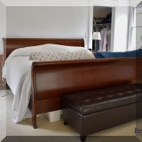 F29. King mahogany sleigh bed. (Mattress not included.) 42”h 